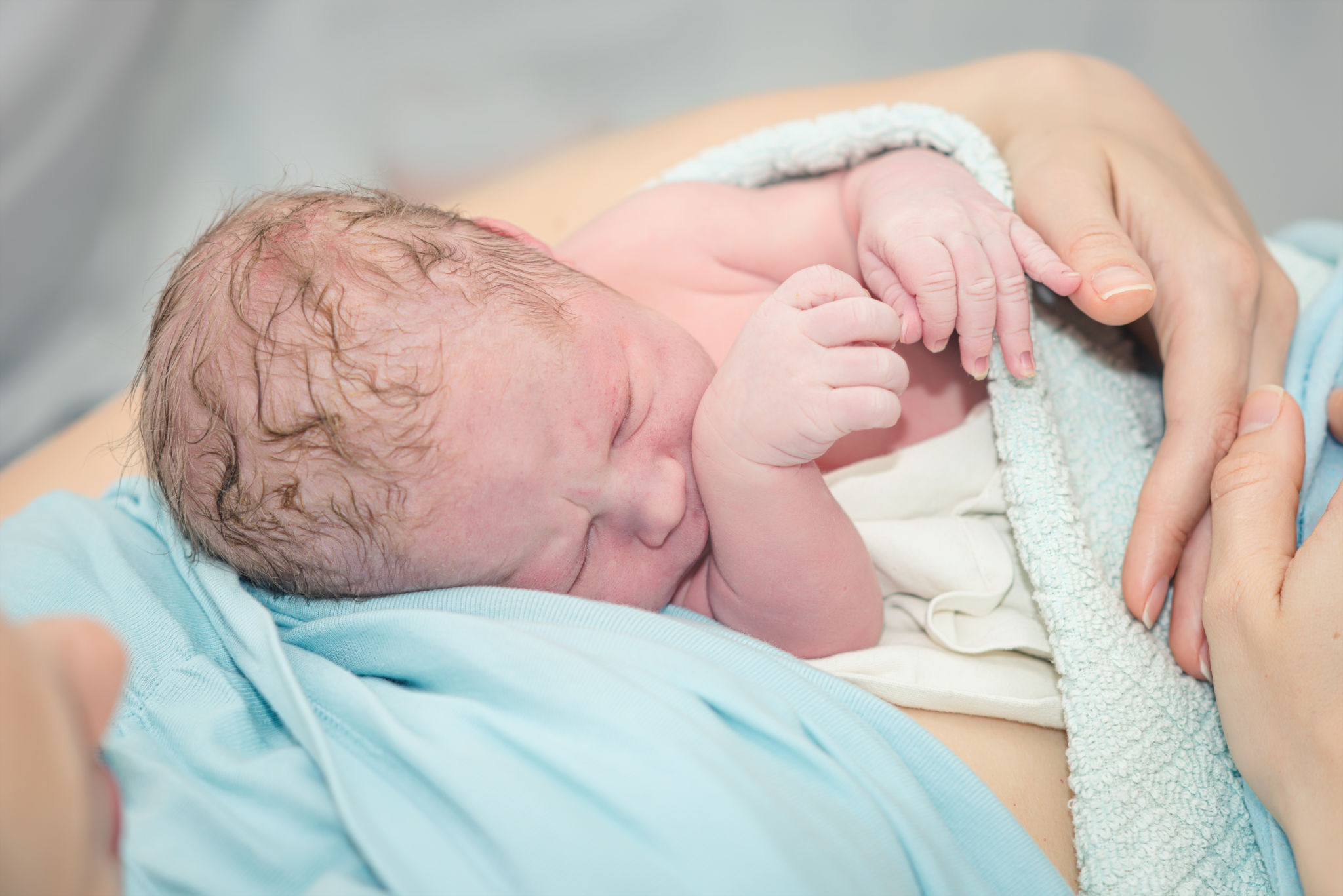Baby With Full Head Of Hair At Birth